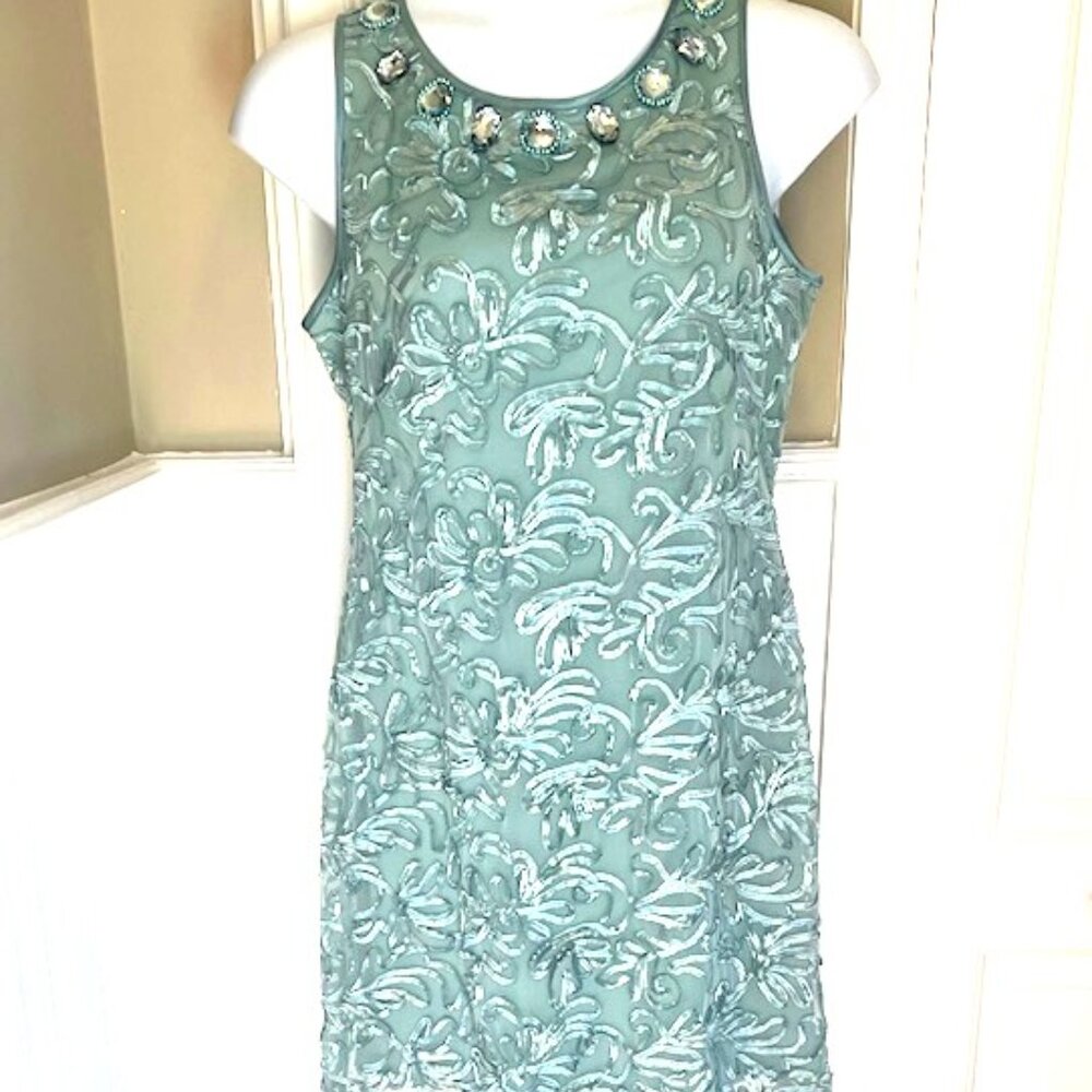 Jessica Howard sleeveless lace turquoise cocktail dress with gem detail.